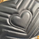 Back view of chic polished women's handbag – women's designer-style accessory