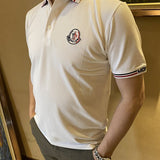 Close-up detail shot of Moncler luxury clothing with tailored silhouette