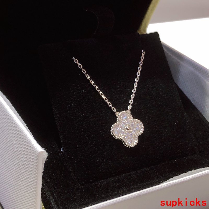 Lifestyle view of Van Cleef & Arpels unisex jewelry piece