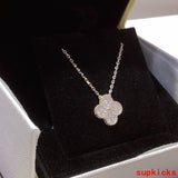 Lifestyle view of Van Cleef & Arpels unisex jewelry piece