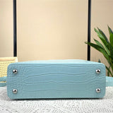  clean-lined handbag styled with outfit 36