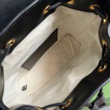 Close-up detail of signature statement women's handbag – women's designer-style accessory