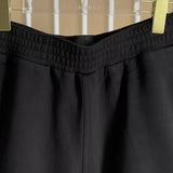 Texture and finish detail of Givenchy luxury piece style No.182
