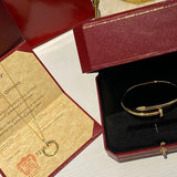 Side view of Cartier unisex jewelry piece