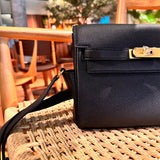 Side view of polished structured handbag