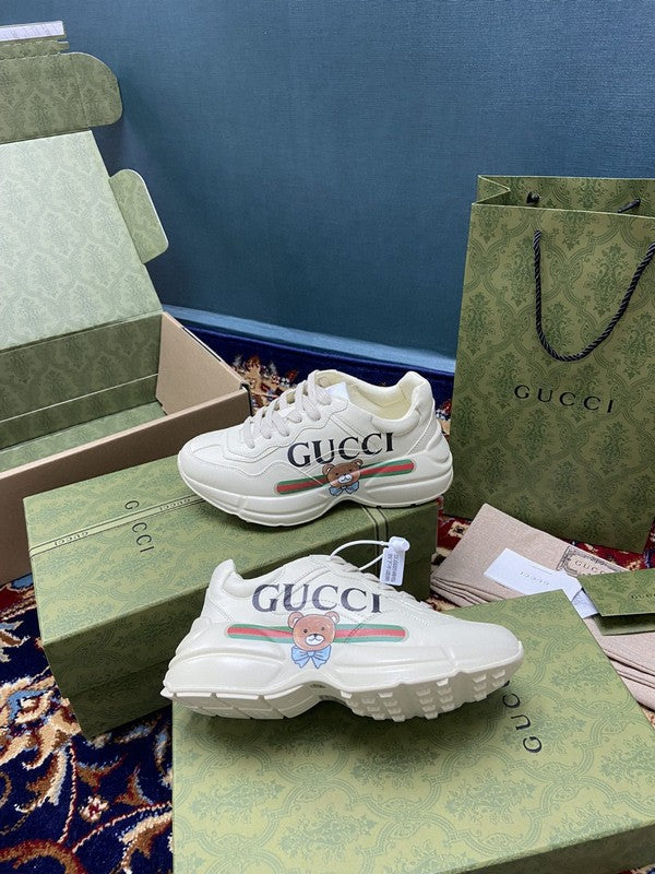 Side profile of Gucci clean off-white sneakers bold athletic profile
