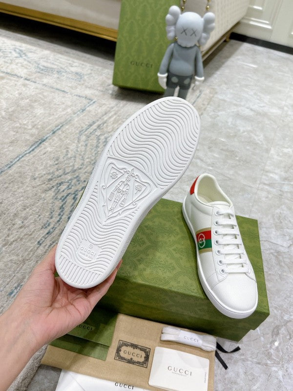 Side profile of Gucci neutral cream sneakers streetwear statement look