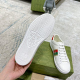 Side profile of Gucci neutral cream sneakers streetwear statement look