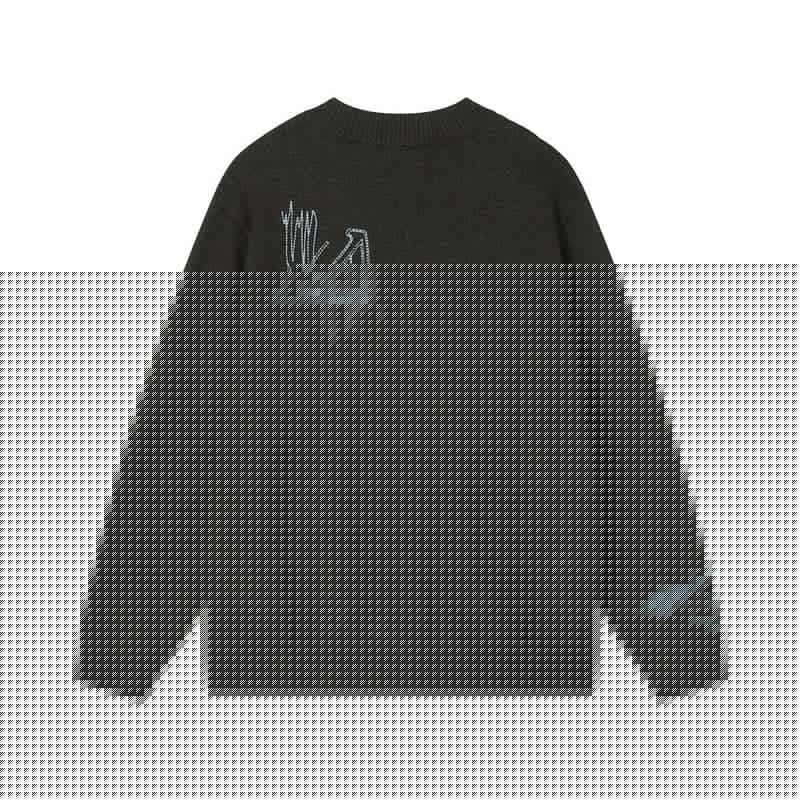 Close-up detail shot of Louis Vuitton luxury clothing with relaxed-fit cut
