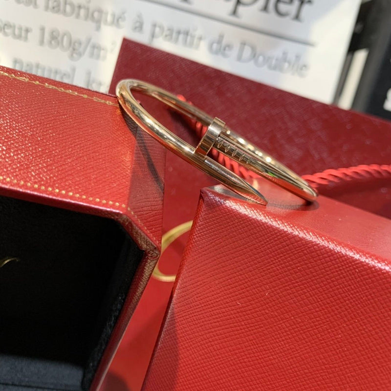 Angled view of Cartier unisex jewelry piece