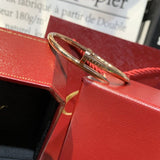 Angled view of Cartier unisex jewelry piece