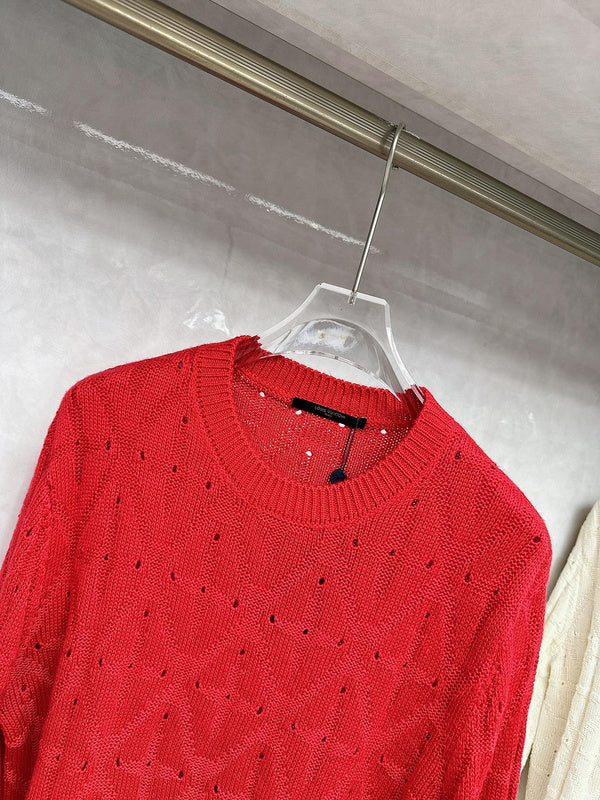 Flat lay presentation of Louis Vuitton luxury clothing with runway-inspired design