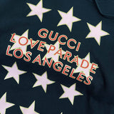 Close-up detail shot of Gucci luxury clothing with logo-detail design