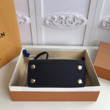Styled lifestyle shot of polished modern women's handbag – women's designer-style accessory