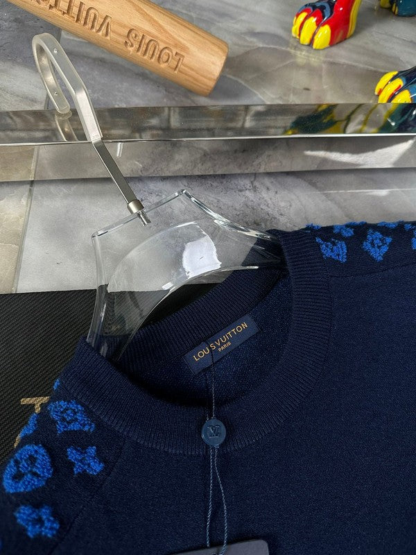 Close-up detail shot of Louis Vuitton luxury clothing with contemporary cut