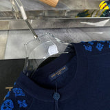 Close-up detail shot of Louis Vuitton luxury clothing with contemporary cut