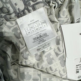 Close-up of Christian Dior Shorts signature hardware and stitching detail