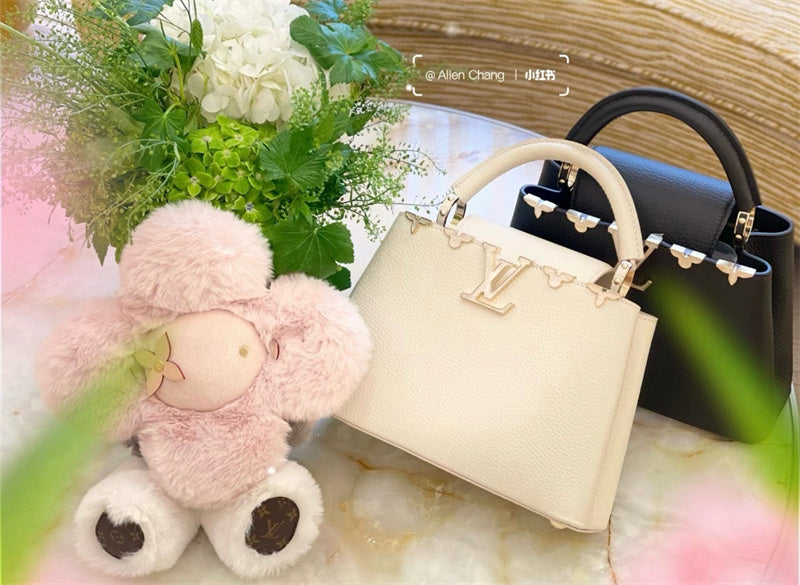  Sleek structured bag carried on shoulder 28