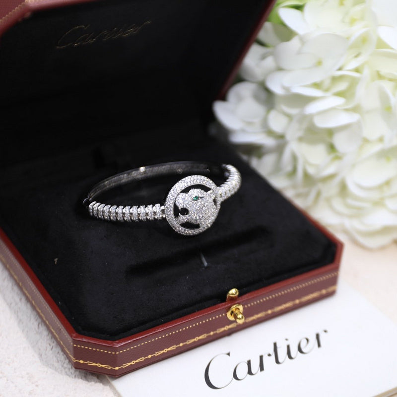 Close-up detail view of Cartier unisex jewelry piece