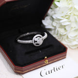 Close-up detail view of Cartier unisex jewelry piece
