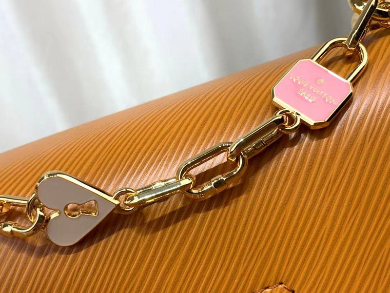Handle and strap detail of chic polished women's handbag – women's luxury handbag