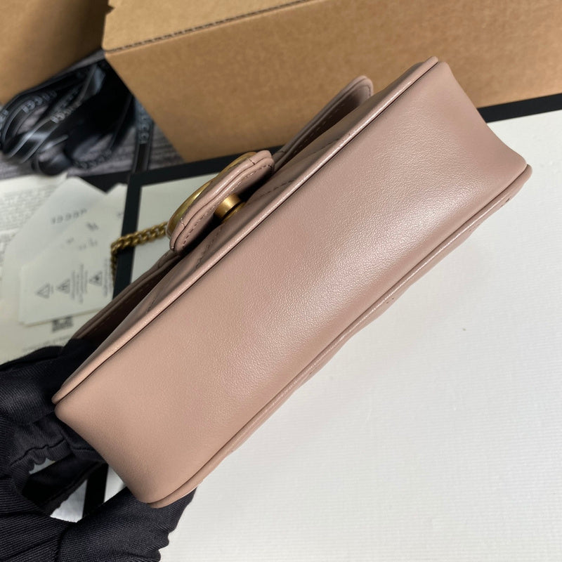 Handle and strap detail of classic polished women's handbag – women's statement bag