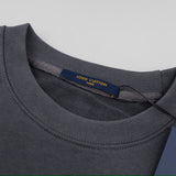 Close-up detail shot of Louis Vuitton luxury clothing with contemporary cut