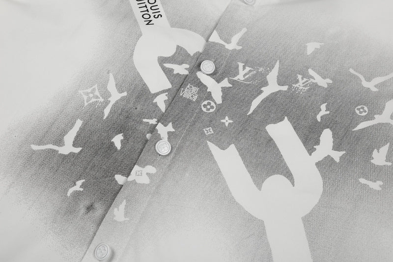 Close-up detail shot of Louis Vuitton luxury clothing with monogram-inspired silhouette