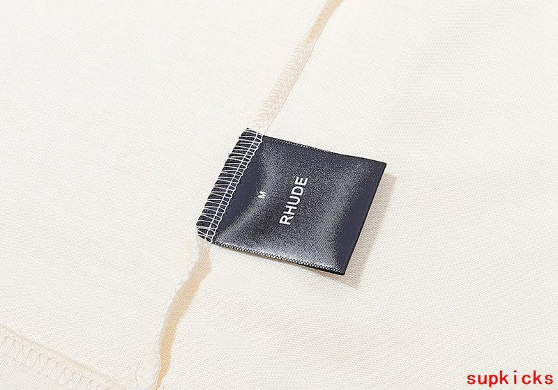 Close-up detail shot of Rhude luxury clothing with everyday silhouette