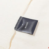 Close-up detail shot of Rhude luxury clothing with everyday silhouette