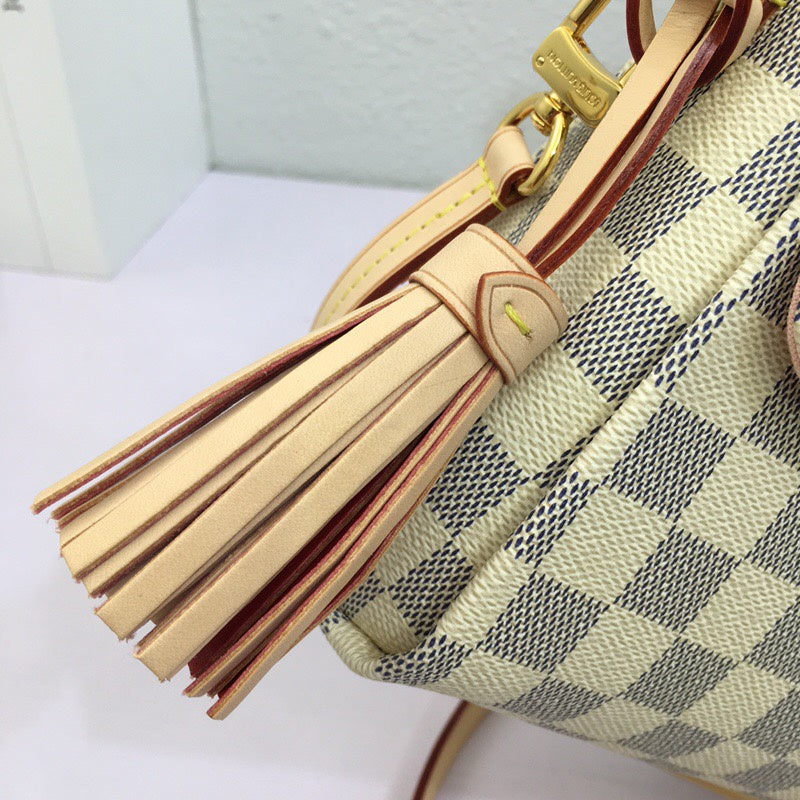 Top view of elevated modern women's handbag – women's luxury accessory