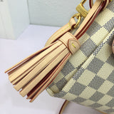 Top view of elevated modern women's handbag – women's luxury accessory