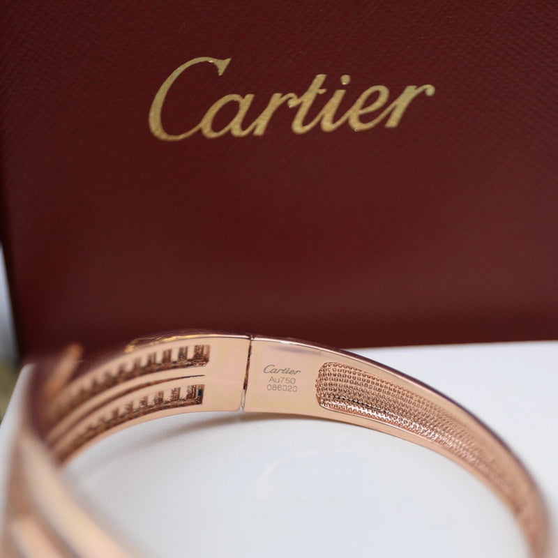 Front view of Cartier unisex jewelry piece