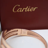 Front view of Cartier unisex jewelry piece