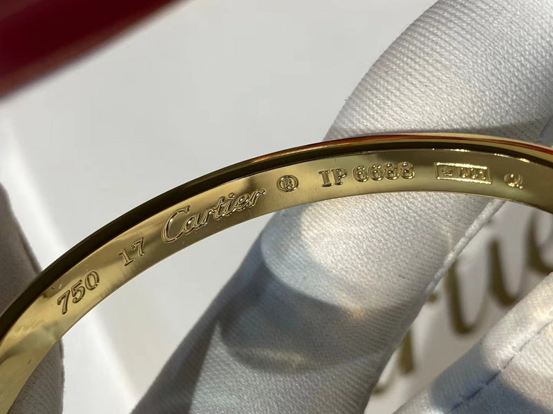 Angled view of Cartier unisex jewelry piece