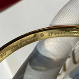 Angled view of Cartier unisex jewelry piece