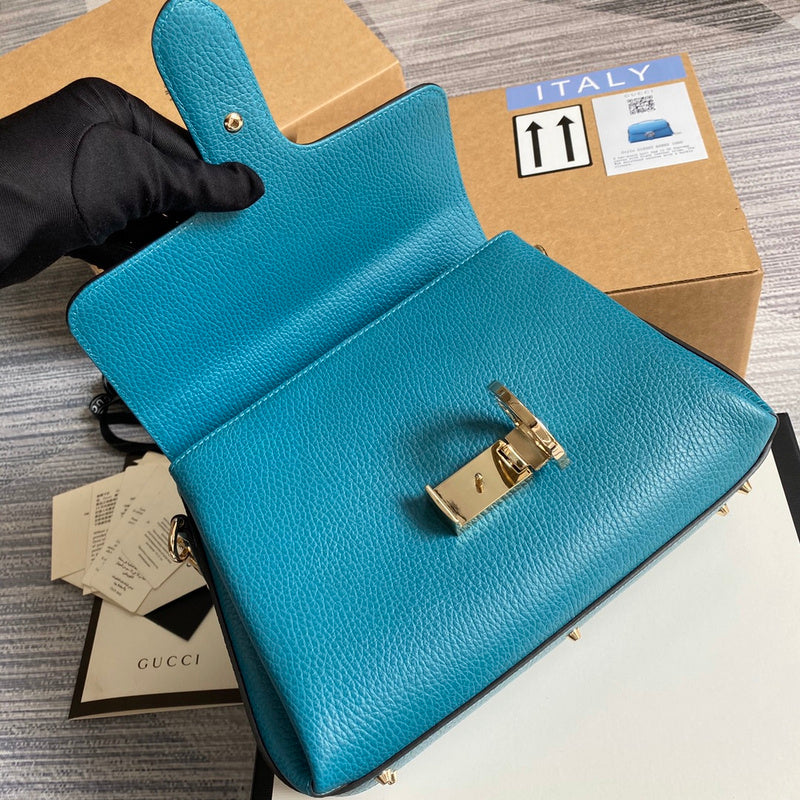 Close-up detail of signature polished women's handbag – women's everyday handbag