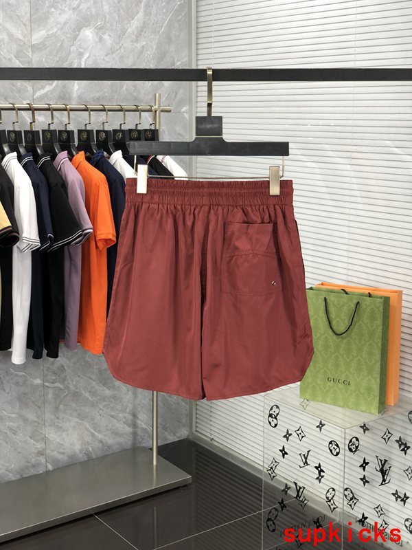 Flat lay presentation of Rhude luxury clothing with runway-inspired design