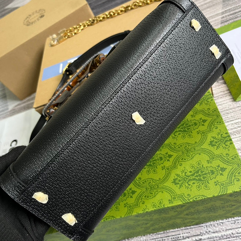 Styled lifestyle shot of refined statement women's handbag – women's luxury handbag