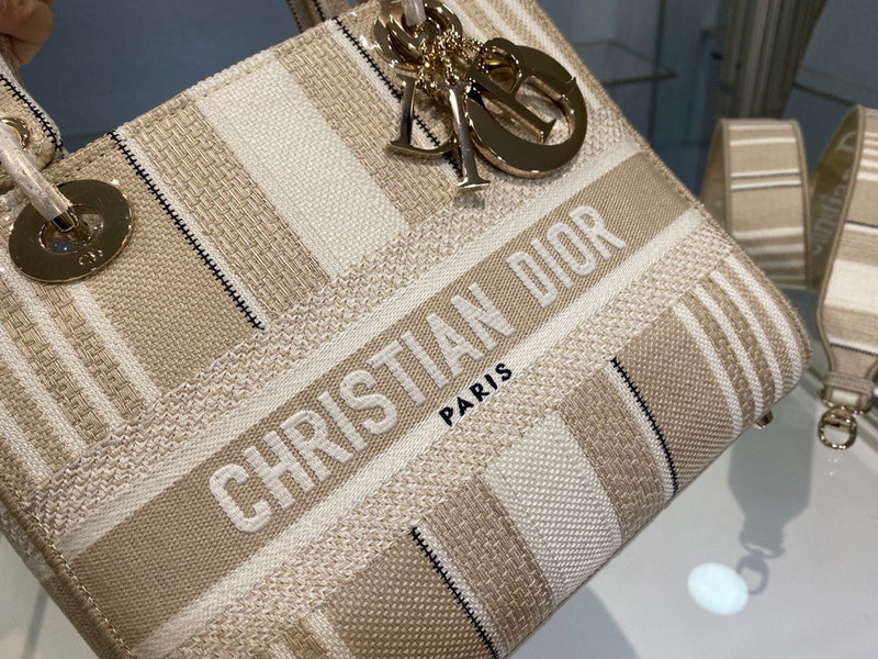 Styled lifestyle shot of signature chic women's handbag – women's designer-style accessory