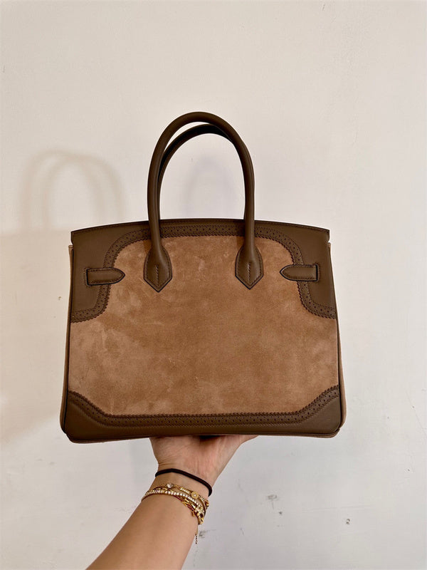  top-handle bag close-up of hardware and finish