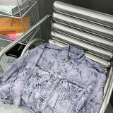 Full styled look of Louis Vuitton luxury clothing with signature branding