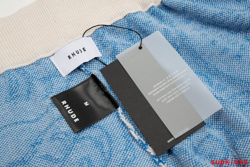 Close-up detail shot of Rhude luxury clothing with runway-inspired design