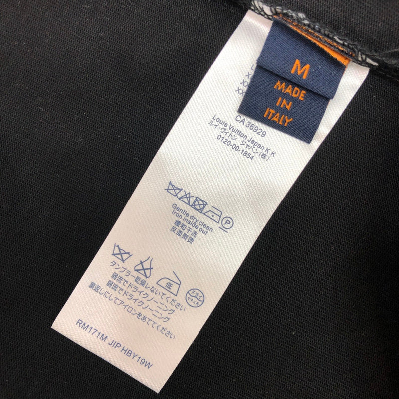 Flat lay presentation of Louis Vuitton cotton t-shirt with logo-detail design