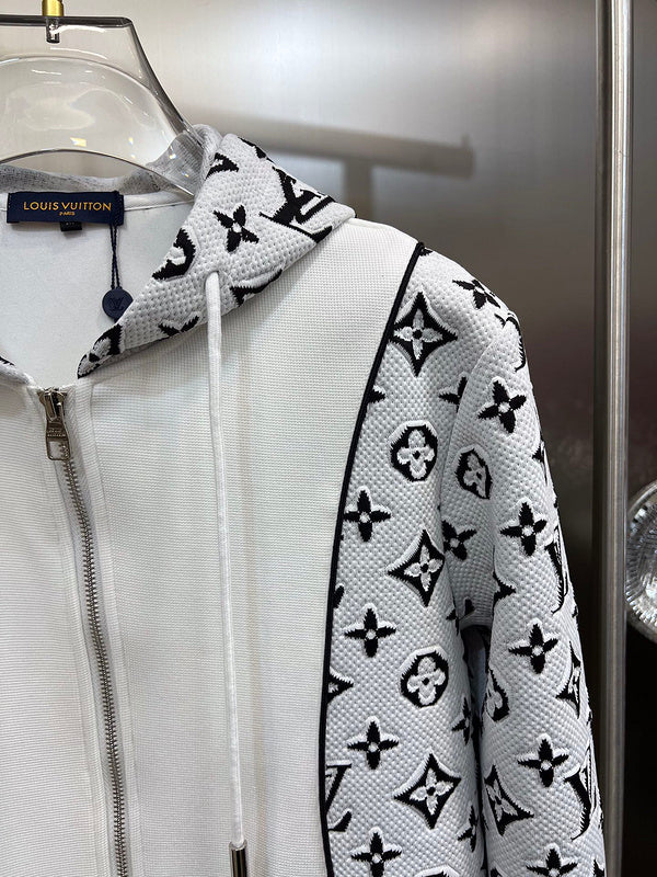 Full styled look of Louis Vuitton luxury clothing with label-forward styling