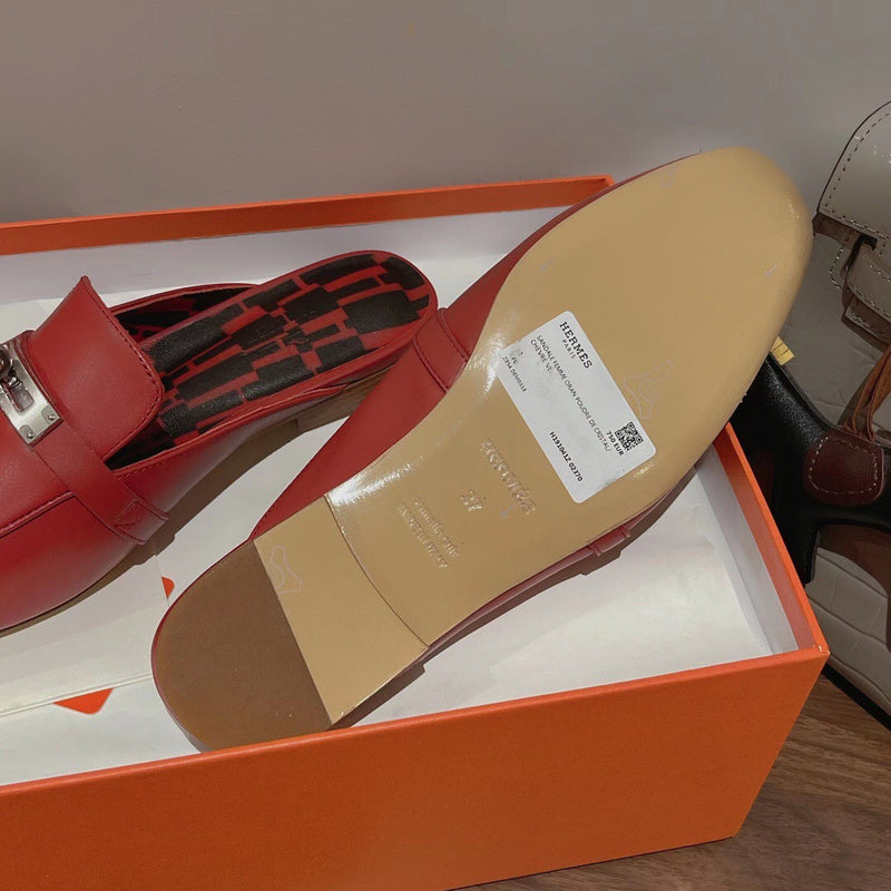 Hermès Red Slip-On Sneakers - Close-Up Texture View