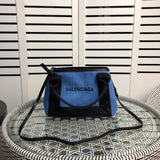Side profile of premium structured women's handbag – women's statement bag