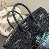 Side view of poised structured handbag