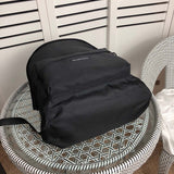 Back view of structured sleek women's handbag – women's statement bag