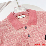 Front view of Moncler luxury clothing with logo-detail design